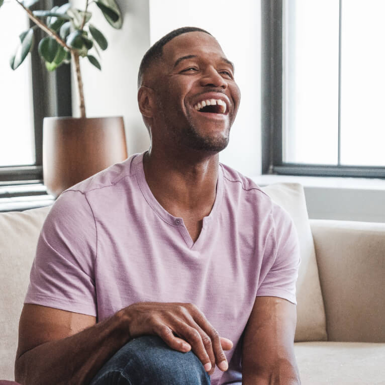 A photo of Michael Strahan laughing